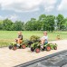 Traktorius su priekaba ir kaušu nuo pedalų „Falk Claas“