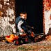 Oranžinis traktorius su priekaba + priedai nuo 1 metų FALK Kubota 
